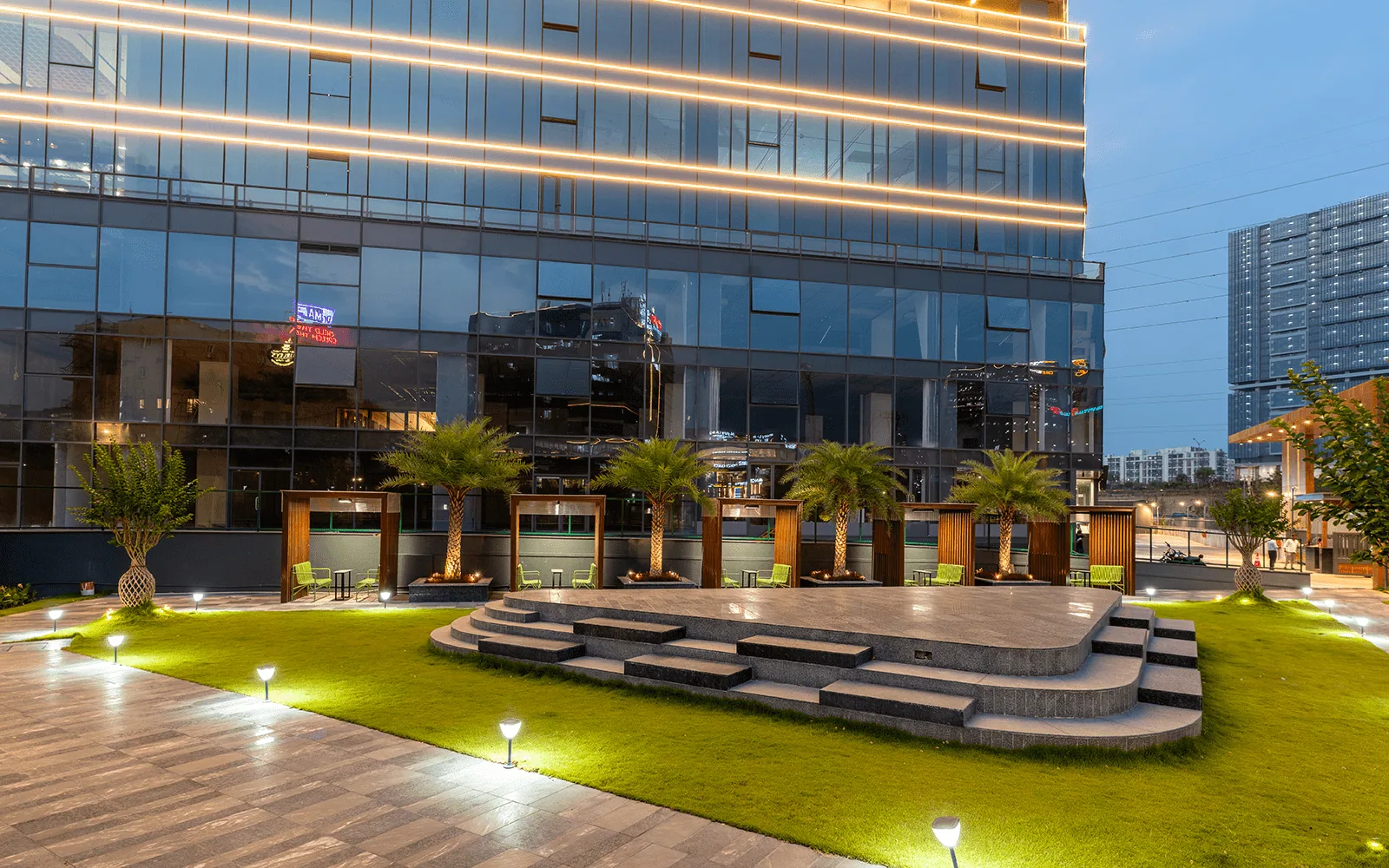Mahaveer Gateway plaza and podium at dusk
